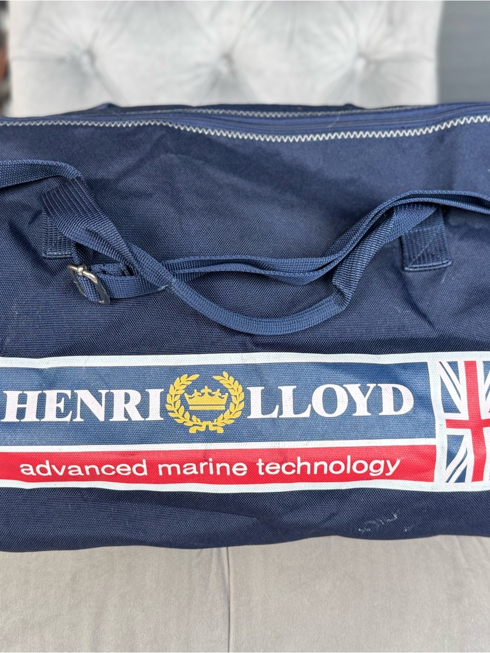 Henri Lloyd Navy Duffel Bag with Red and White Accents